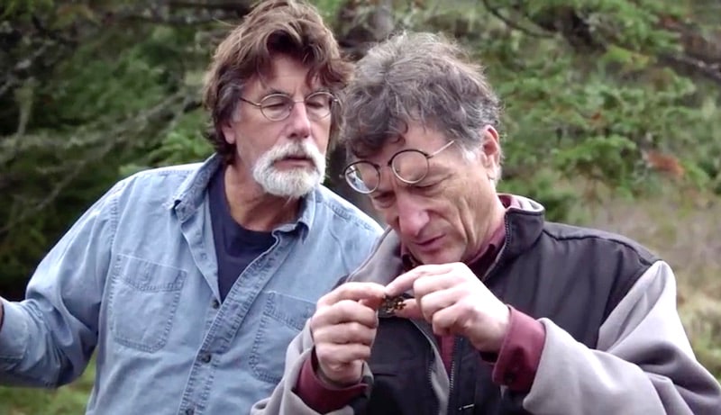 Rick and Marty Lagina examining keyhole