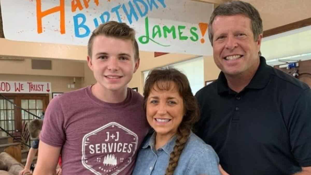 James Duggar with is parents Jim Bob and Michelle Duggar.