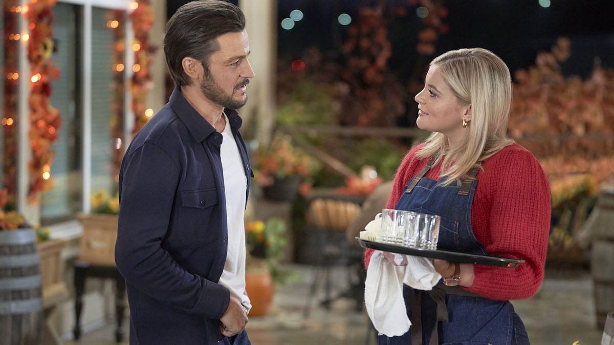 Tyler Hynes and Lauren Alaina in the Hallmark Channel movie Roadhouse Romance.