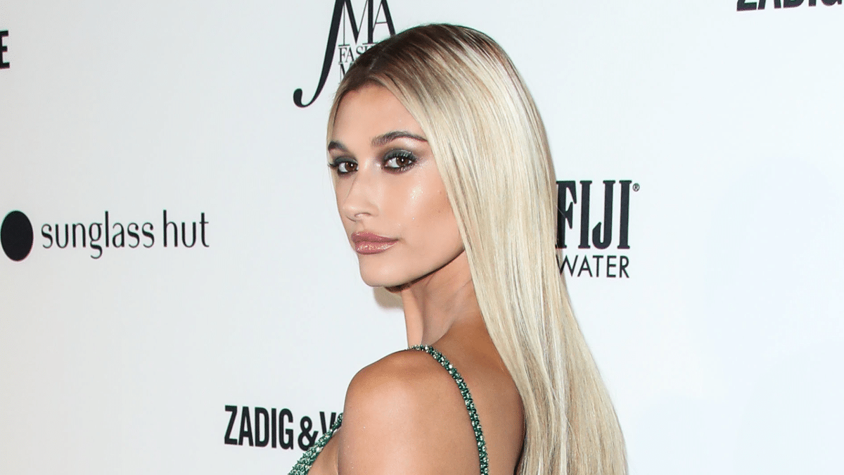 Hailey Bieber wearing a Tommy Hilfiger dress and Lorraine Schwartz jewelry arrives at the Daily Front Row's 2018 Fashion Media Awards.