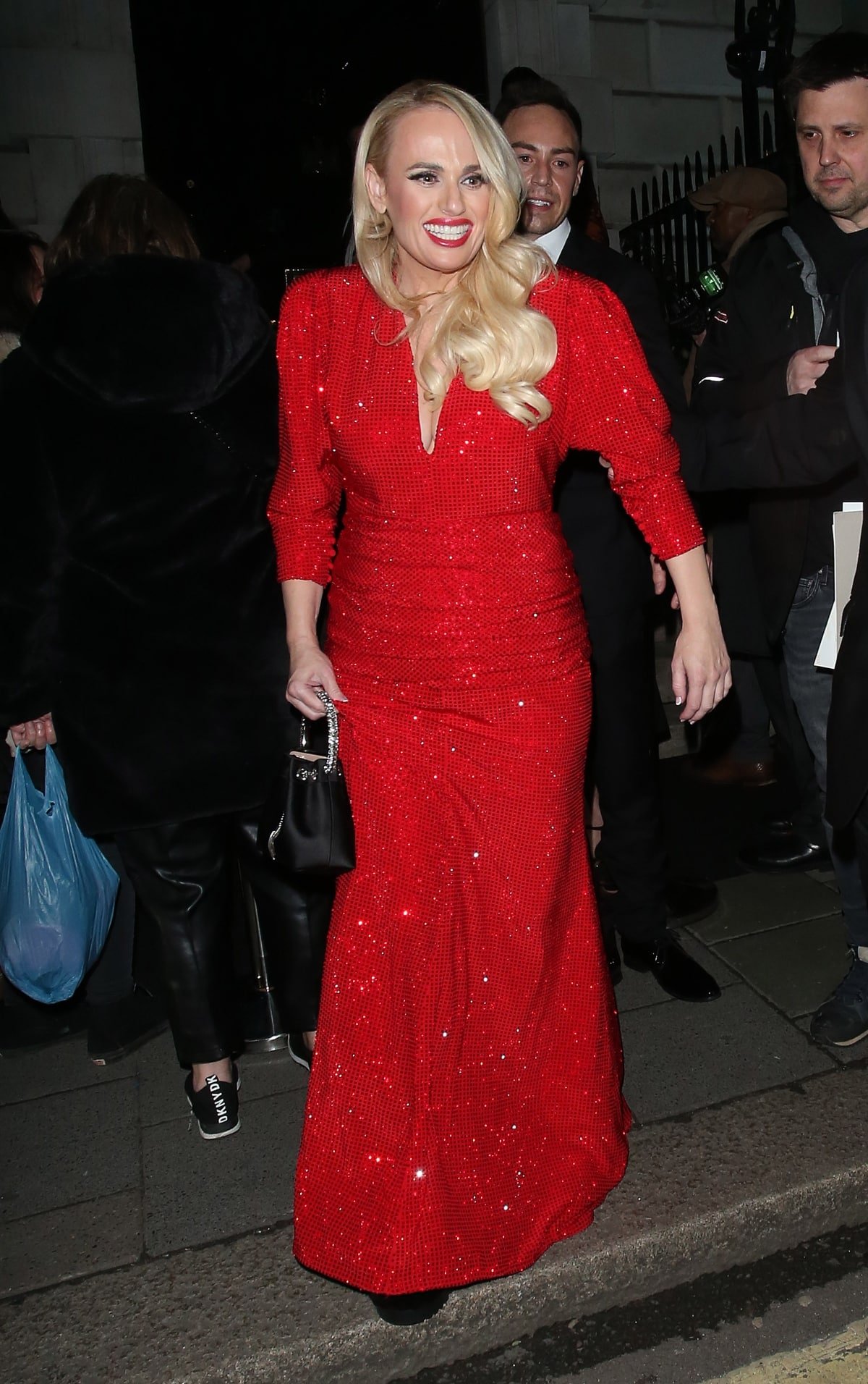 Rebel Wilson looks super slim in bright red dress at a BAFTA afterparty ...