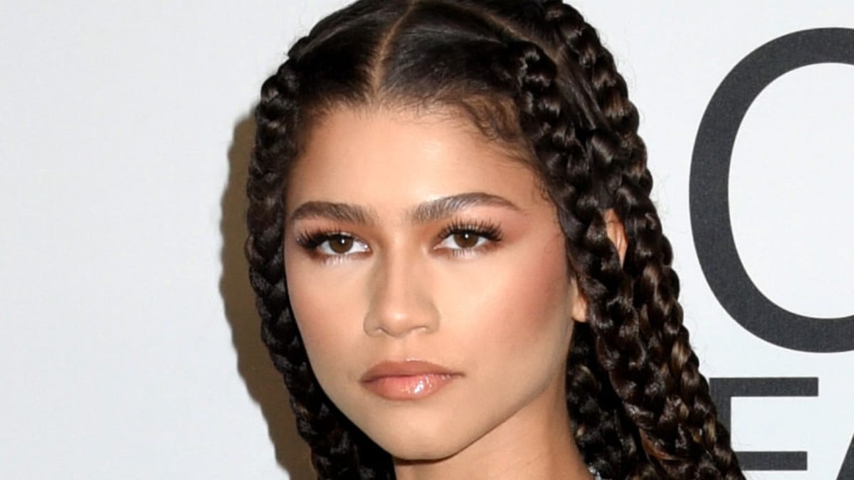 Zendaya stuns in plunging red gown with her Emmy at HBO Max party