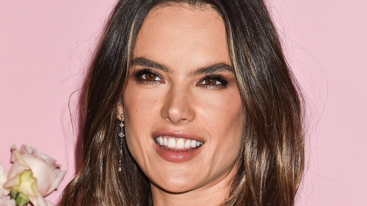 Alessandra Ambrosio smiles into camera.