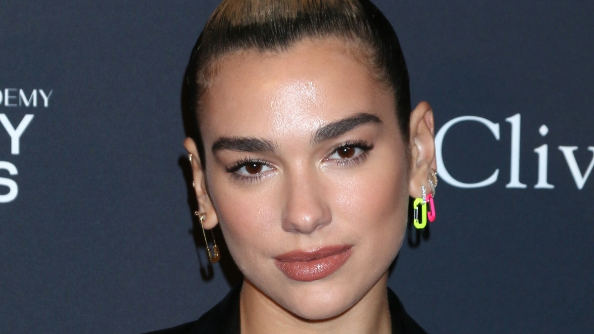 Dua Lipa goes chic in yellow fishnet dress while in Asia ...