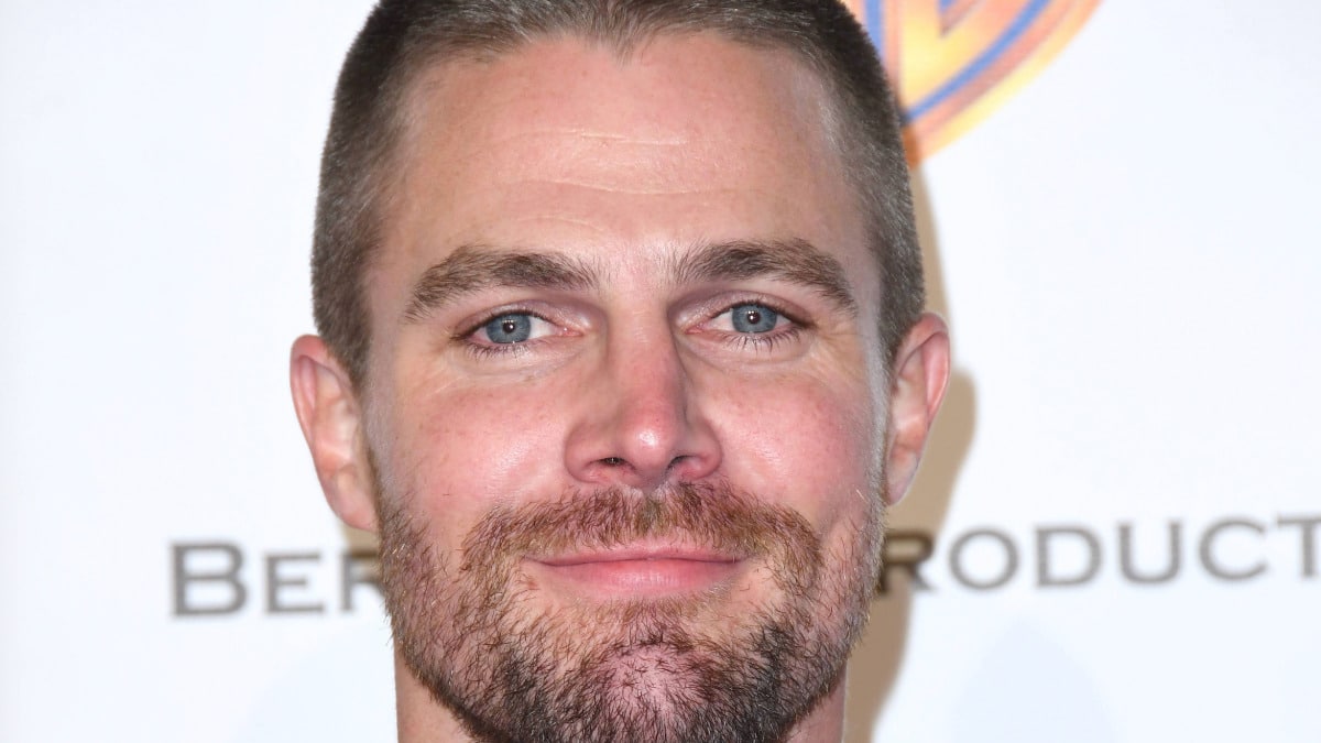 Stephen Amell attends event.
