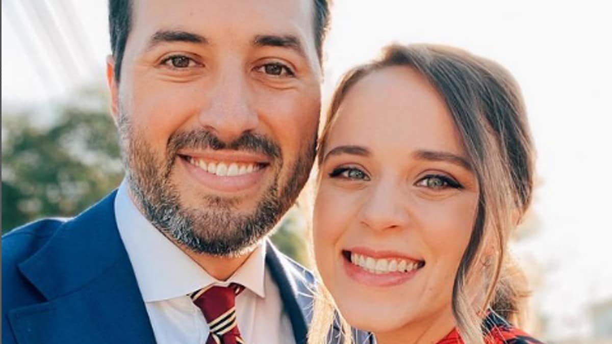 Jeremy Vuolo and Jinger Duggar together at a wedding.