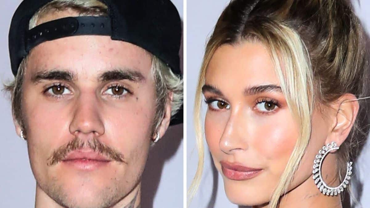 justin and hailey bieber post on the red carpet at a youtube premiere