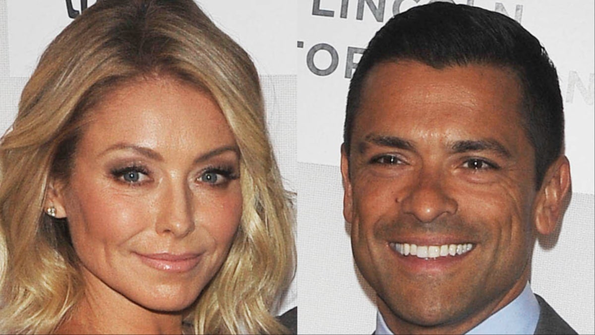 Kelly Ripa and Mark Consuelos on a red carpet