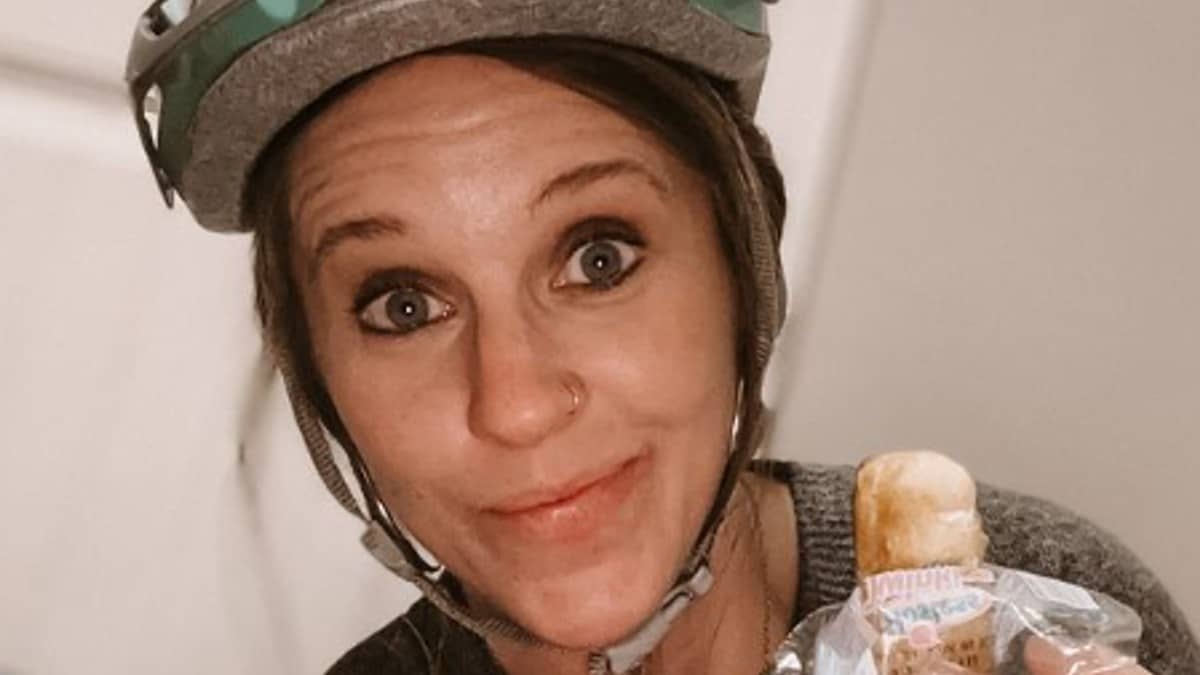 Jill Duggar posing with her helmet